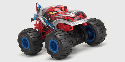 Blå Flash4 MAX fjernstyret buggy med firehjulstræk og grove offroad-dæk klar til kørsel i terræn.