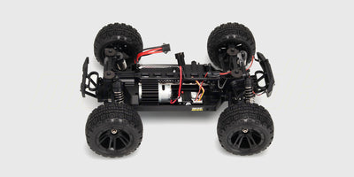 Chassis-detaljer af Hunter MT10 fjernstyret monster truck uden karrosseri vist på hvid baggrund.