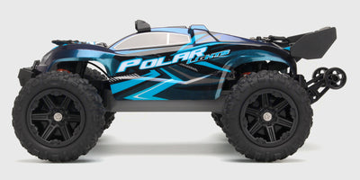 Hurricane XL fjernstyret monstertruck med grønt karrosseri og store offroad-hjul vist på hvid baggrund.