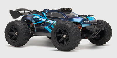 Hurricane XL fjernstyret monster truck i orange og sort med store offroad dæk og kraftig affjedring.