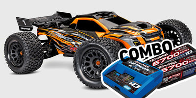 Traxxas XRT 8S race truck i rød og sort vist med fjernbetjening og batteripakke på hvid baggrund.